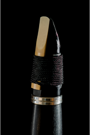 Clarinet construction: the reed is sometimes attached with a reed string
